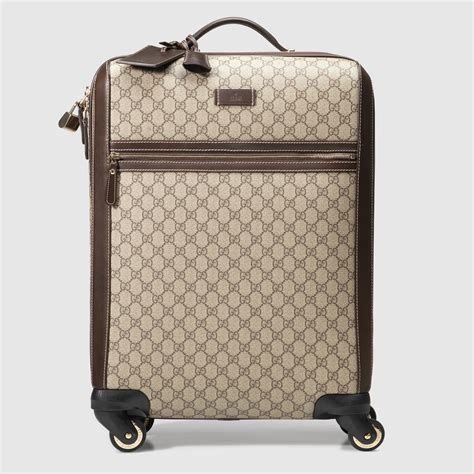 gucci hand luggage case|Gucci suitcase with wheels.